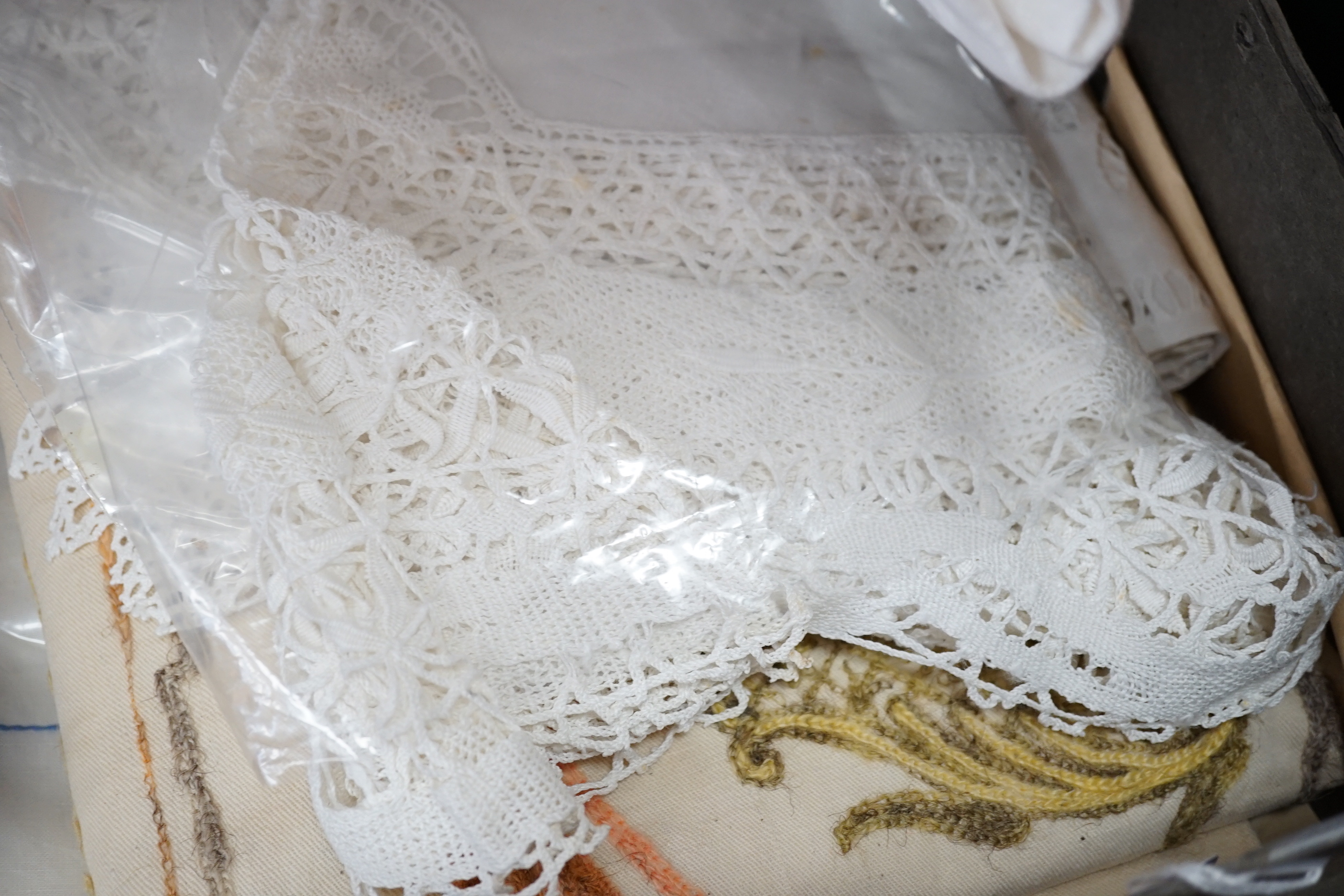 A collection of drawn thread work, cut work and damask cloths including a secessionist damask cloth and a 1920’s crewel worked cloth